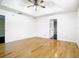 Inviting bedroom with wood floors, a tray ceiling, and neutral walls to make your own at 1233 Gladstone Dr, Deltona, FL 32725