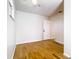 Bedroom featuring hardwood floors, a ceiling fan, and a doorway at 1233 Gladstone Dr, Deltona, FL 32725