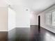 Bright living room featuring glossy tiled floors and large windows at 1233 Gladstone Dr, Deltona, FL 32725
