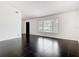 Bright living room with sleek tile flooring, neutral paint, and lots of natural light at 1233 Gladstone Dr, Deltona, FL 32725