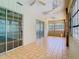 Spacious enclosed sunroom featuring tile flooring and natural light at 1233 Gladstone Dr, Deltona, FL 32725
