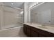 Bathroom features a dual sink vanity and a shower with glass door at 12335 Cruxbury Dr, Windermere, FL 34786