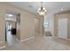 Open living space showcasing seamless transition to kitchen, enhancing flow and natural light at 12335 Cruxbury Dr, Windermere, FL 34786