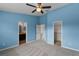 Spacious bedroom with ensuite bathroom and closet entrances at 12335 Cruxbury Dr, Windermere, FL 34786