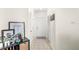 Inviting entryway with tiled floors and a decorative shelf at 12837 Madison Pointe Cir # 206, Orlando, FL 32821