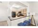 Kitchen view from the breakfast bar and living area at 12837 Madison Pointe Cir # 206, Orlando, FL 32821