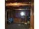 Unfinished attic features wood beams, shelves, and various storage items at 13111 Sunshine Cir, Clermont, FL 34711