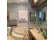 Bathroom featuring a soaking tub and vanity at 13111 Sunshine Cir, Clermont, FL 34711