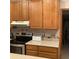 Kitchen features stainless steel oven and light countertops at 13111 Sunshine Cir, Clermont, FL 34711