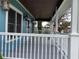 Inviting covered porch with views of the neighborhood at 13111 Sunshine Cir, Clermont, FL 34711