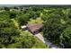 A peaceful property with a single-Gathering home surrounded by lush trees and green space at 1391 Terry Ln, Kissimmee, FL 34744