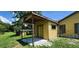 View of backyard and utility building; this partially fenced yard offers privacy at 1391 Terry Ln, Kissimmee, FL 34744