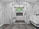 Newly remodeled bathroom featuring a sleek shower and vanity with modern fixtures and lighting at 1391 Terry Ln, Kissimmee, FL 34744