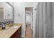 Well-lit bathroom featuring granite vanity, tile accents, and modern fixtures for a stylish, clean look at 14131 Islamorada Dr, Orlando, FL 32837