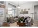 Cozy living room area with comfortable seating, natural light, and stylish decor at 14131 Islamorada Dr, Orlando, FL 32837