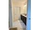 Bathroom features a double vanity, granite countertops, and modern lighting fixtures, with neutral color scheme at 16391 Admirals Cove Ln, Winter Garden, FL 34787