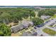 Aerial view of the neighborhood with tree-lined streets at 1642 Windsor Oak Ct, Kissimmee, FL 34744