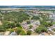 Wide aerial view of the neighborhood and surrounding area at 1642 Windsor Oak Ct, Kissimmee, FL 34744