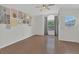 Bright room with lots of natural light, art, and curtains at 1642 Windsor Oak Ct, Kissimmee, FL 34744