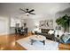Inviting living room featuring modern furnishings, hardwood floors, and an open floor plan at 184 Sandlewood Trl # 2, Winter Park, FL 32789