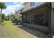 Spacious screened porch with comfortable seating, ideal for relaxing and entertaining outdoors at 184 Sandlewood Trl # 2, Winter Park, FL 32789