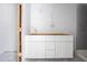 Bathroom vanity with white cabinets and ample storage space ready for finishing at 1900 Sw 178Th Street Rd, Ocala, FL 34473