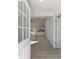 Inviting view through the front door into the home's open-concept living space and kitchen at 2041 Sw 178Th Lane Rd, Ocala, FL 34473