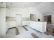 Unfinished kitchen boasts new cabinets, ample counter space, and an open design at 2041 Sw 178Th Lane Rd, Ocala, FL 34473
