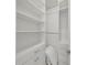 Walk-in closet with built in shelving and drawers for maximum storage and organization at 242 W Lyman Ave, Winter Park, FL 32789