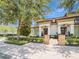 Charming two-story home featuring well-maintained landscaping, brick accents and a wrought iron fence at 242 W Lyman Ave, Winter Park, FL 32789