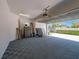 Well-organized garage with patterned flooring and ample storage space at 242 W Lyman Ave, Winter Park, FL 32789