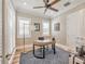 Bright office space with natural light, hard wood floors, and a custom desk at 242 W Lyman Ave, Winter Park, FL 32789