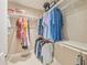 Organized walk-in closet with clothing racks and shelving at 242 W Lyman Ave, Winter Park, FL 32789