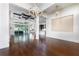 Open-concept layout featuring a living room, dining area, and modern kitchen at 25859 Crossings Bluff Ln, Sorrento, FL 32776
