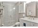 Updated bathroom featuring a glass enclosed shower and a modern vanity at 2627 Maitland Crossing Way # 101, Orlando, FL 32810