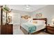 Comfortable bedroom featuring a ceiling fan, natural light, and light tile floors at 2627 Maitland Crossing Way # 101, Orlando, FL 32810