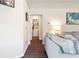 Hallway view of the living room and laundry room with washer and dryer at 2903 Willow Oak Ct, Kissimmee, FL 34744