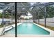 This screened in pool offers a safe, private place to cool off during the hot summer months at 2903 Willow Oak Ct, Kissimmee, FL 34744