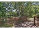A spacious deck overlooks the lush, green backyard at 2915 Hargill Dr, Orlando, FL 32806