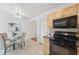 Eat-in kitchen features tile floors, stainless appliances, and plenty of counter space at 2915 Hargill Dr, Orlando, FL 32806