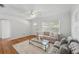 Spacious living room featuring hardwood floors and a ceiling fan at 2915 Hargill Dr, Orlando, FL 32806