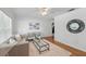 Cozy living room with hardwood floors, a ceiling fan, and neutral decor at 2915 Hargill Dr, Orlando, FL 32806
