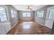Bonus room offering wood-look floors, multiple windows and two doors at 2928 Ne 14Th Ave, Ocala, FL 34479