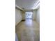 Room with tile floor and sliding glass door at 2928 Ne 14Th Ave, Ocala, FL 34479