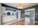 Bright kitchen featuring white cabinets, updated appliances, and stylish countertops at 2928 Ne 14Th Ave, Ocala, FL 34479