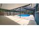 Pool displaying screened-in lanai, fencing and lots of space for entertaining at 2928 Ne 14Th Ave, Ocala, FL 34479