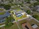 Aerial view of backyard pool, outdoor storage shed, and privacy fence at 2966 Derby Dr, Deltona, FL 32738