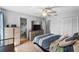 Bedroom with TV, furnishings, and closet space at 2966 Derby Dr, Deltona, FL 32738