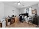 Home office featuring dual monitors, neutral walls, and a ceiling fan at 2966 Derby Dr, Deltona, FL 32738