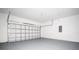 Spacious two-car garage with ample room for vehicles and storage at 33 W 7Th St, Apopka, FL 32703
